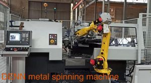DENN metal spinning work cell